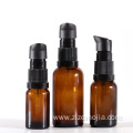 Empty glass amber cosmetic skincare cream pump bottle